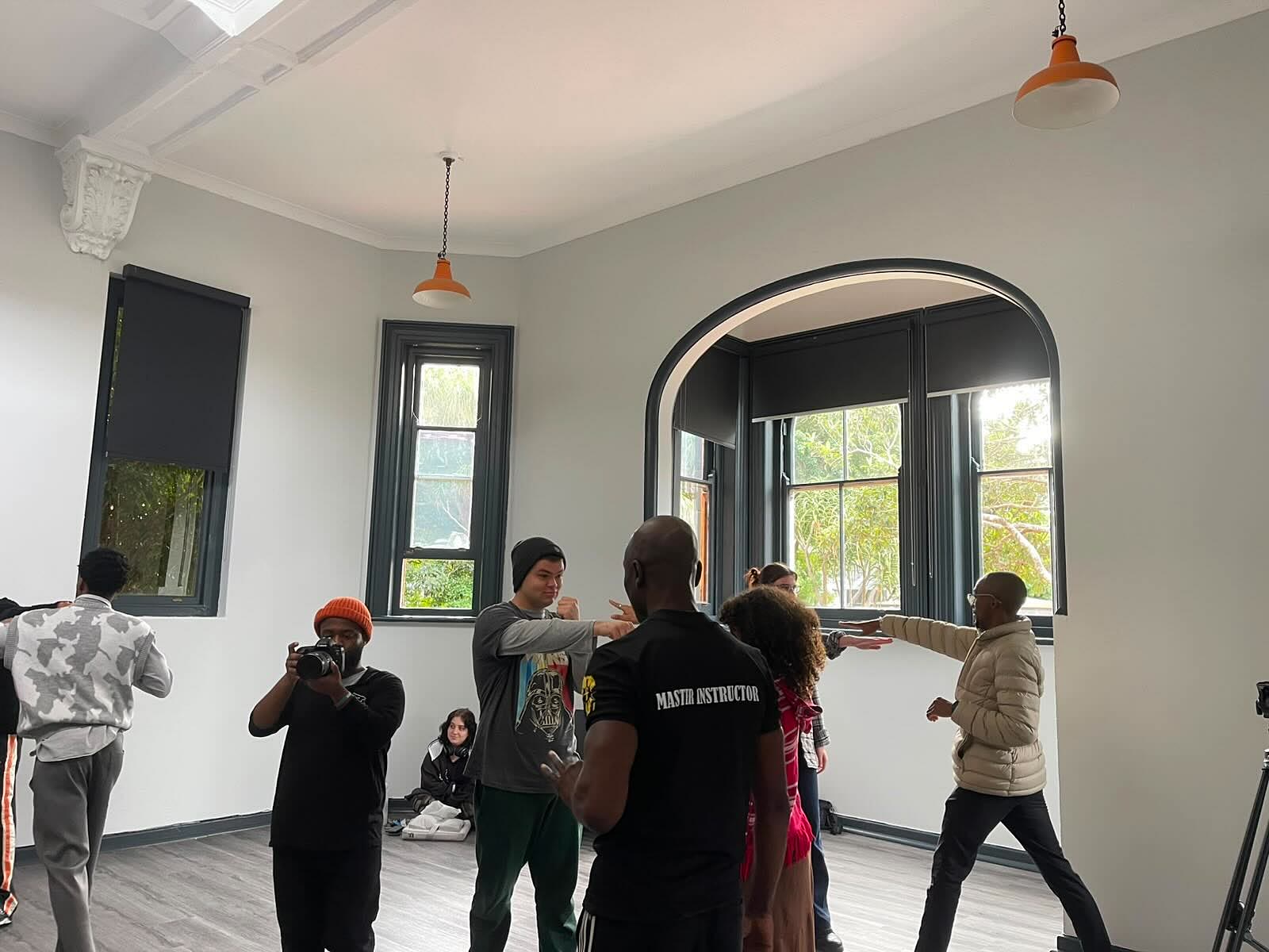 Osondu Thambo leading a 52 Blocks self-defense workshop in South Africa while it is filmed